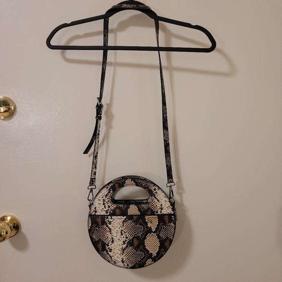 Enzo Angiolini Handbags - FAUX SNAKE SKIN ROUND PURSE